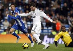 Real Madrid 3-0 Espanyol: Higuain controls the ball past Espanyol's goalkeeper Carlos Kameni as he rounds him up and rounds the scoreline as well.