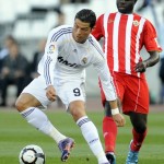 Almeria's Cameroonian Bami (R) vies with Almeria's Cameroonian Bami (R) vies with
