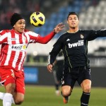 Almeria's Marcelo Silva challenges Real Madrid's Cristiano Ronaldo uring their Spanish first division match in Almeria Almeria's Marcelo Silva challenges Real Madrid's Cristiano Ronaldo uring their Spanish first division match in Almeria