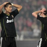Real Madrid's Cristiano Ronaldo and Xabier Alonso react after a missed scoring opportunity during their Spanish first division match against Almeria in Almeria Real Madrid's Cristiano Ronaldo and Xabier Alonso react after a missed scoring opportunity during their Spanish first division match against Almeria in Almeria