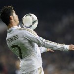 Real Madrid's Cristiano Ronaldo controls the ball during their Spanish King's Cup soccer match against Barcelona in Madrid Real Madrid's Cristiano Ronaldo controls the ball during their Spanish King's Cup soccer match against Barcelona in Madrid