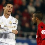 Real Madrid's Cristiano Ronaldo reacts beside Mallorca's Fernando Tissone during their Spanish first division soccer match in Palma de Mallorca Real Madrid's Cristiano Ronaldo reacts beside Mallorca's Fernando Tissone during their Spanish first division soccer match in Palma de Mallorca