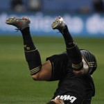 Real Madrid's Ronaldo falls after missing a scoring opportunity against Malaga during his Spanish King's Cup soccer match in Malaga Real Madrid's Ronaldo falls after missing a scoring opportunity against Malaga during his Spanish King's Cup soccer match in Malaga